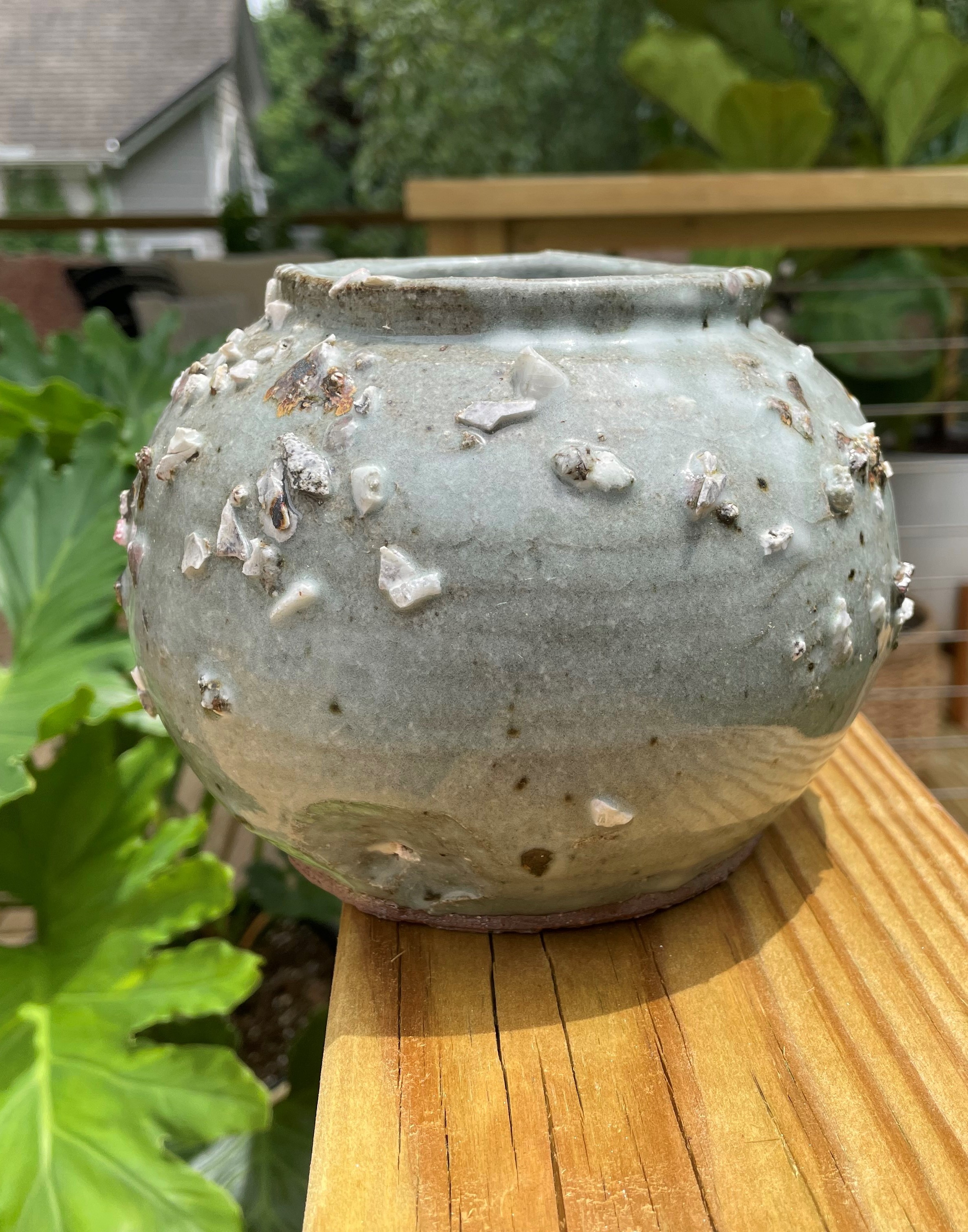 Experimental vase with crystalline glaze inclusions.